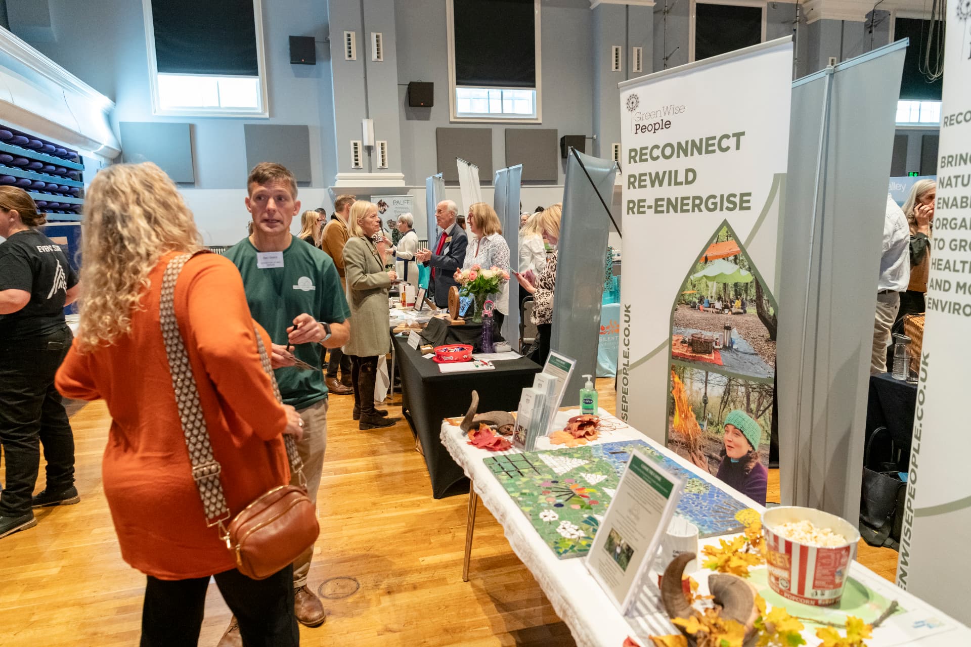 Member organisations presenting their work at exhibition stands during a Surrey Hills showcase